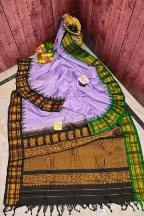 Dark Lavender Color Gadwal Silk Saree with Ganga Jamuna Border & Golden Butta Work